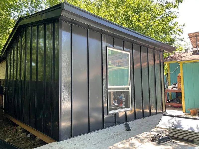 Black standing seam metal wall panels for Metal Roof Installation in Rolesville