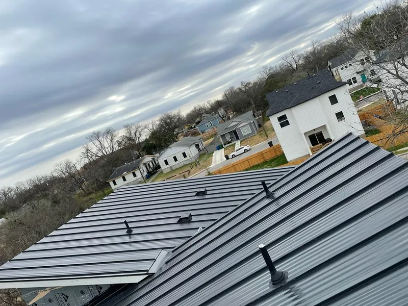 Standing seam metal roof panels with vents for Skylight Repair in Rolesville
